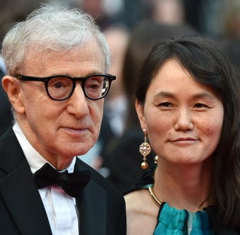 US director Woody Allen and his wife Soon-Yi Previn pose as they arrive on May 11, 2016 for the screening of the film 