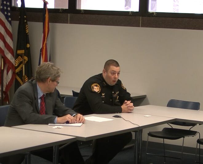 Sandusky County Sheriff's Office Deputy Brandon Kimmet, with attorney George Gerkin, was interviewed by Lucas County Sheriff's Office Internal Affairs in April and May regarding his role in deleting items from a county-owned computer.