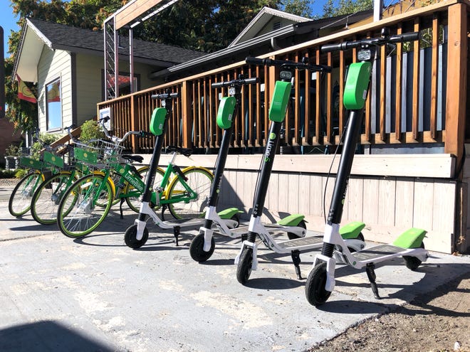 Lime Scooters and Lime Bikes parked in front of Sup restaurant in Midtown the morning of Sept. 18, 2018.