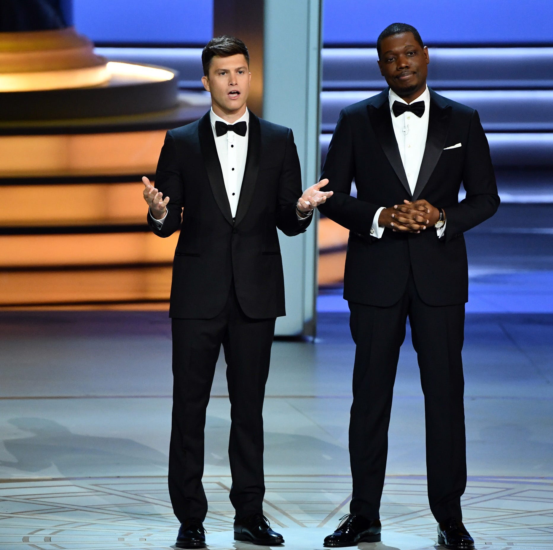 Colin Jost and Michael Che deliver the opening monologue during the 70th Emmy Awards.
