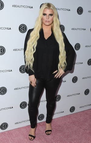 Jessica Simpson, in Los Angeles in July, revealed she is expecting a third child on Instagram Tuesday.
