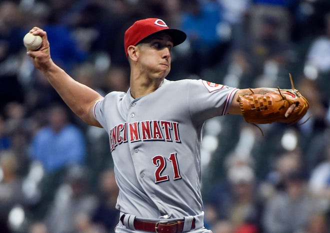 Sep 18, 2018; Milwaukee, WI, USA;  Cincinnati Reds pitcher Michael Lorenzen (21) throws a pitch in the first inning against the Milwaukee Brewers at Miller Park.