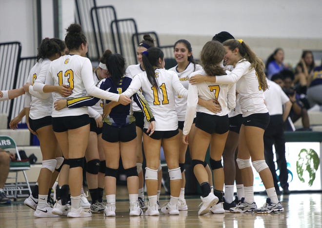 PHOTO GALLERY: Colonia at East Brunswick volleyball