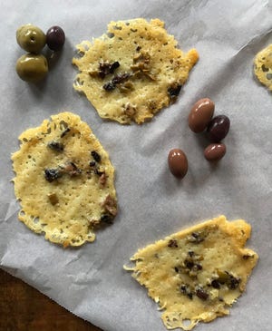 Olive Cheese Crisps are crunchy, cheesy bits of goodness: a gluten-free "cracker."