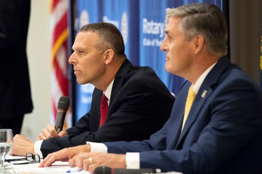 U.S. Rep. Scott Perry, R-York County, left, speaks during a debate with Democratic challenger George Scott at the Country Club of York on Wednesday. The two will compete in the Nov. 6 election for the newly created 10th Congressional District.