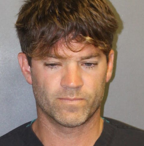 A booking image released by the Orange County District Attorney's Office showing Grant William Robicheaux, 38. He was arrested and charged for allegedly sexually assaulting two women by use of drugs, in Newport Beach, California.