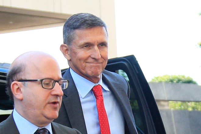Former President Donald Trump national security adviser Michael Flynn, right, arrives at federal courthouse in Washington, for status hearing on July 10, 2018.