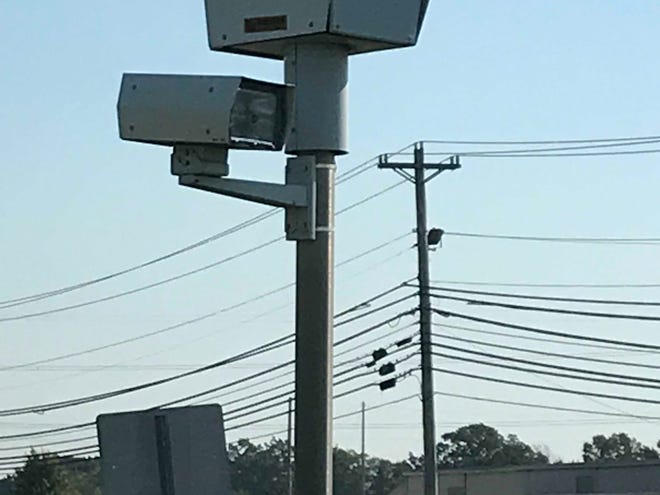 A red-light camera at Wilma Rudolph Boulevard and Dunbar Cave Road.
