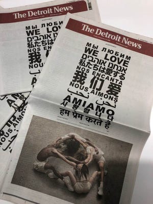 The ad says "We Love" in 11 languages and includes photos of dancers wearing the shoes, which go on sale to the public on Friday.