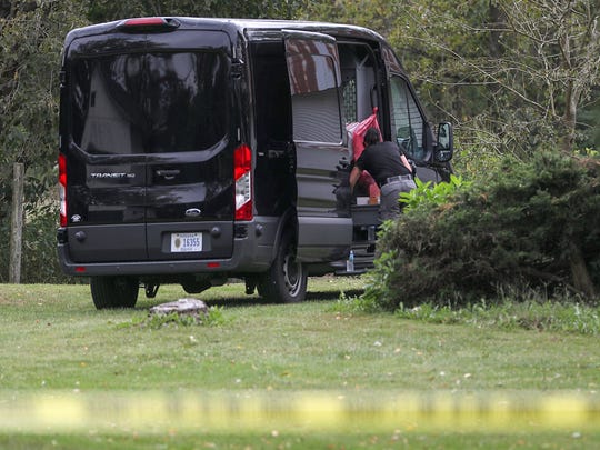 The scene where police investigate the death of a father and two children as a double murder-suicide in an area northeast of Northfield, in rural Boone County, near Zionsville, in the United States. Indiana, September 21, 2018. To contact the children, police found Michael Hunn, 50, and Zionsville students, Harrison Hunn, 15, and Shelby Hunn, 13, who had died in Michael's house to 11 am Friday.