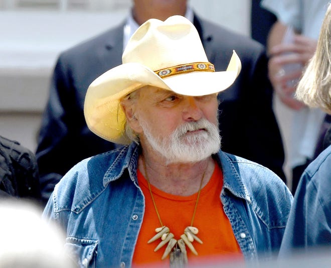 FILE - In this June 3, 2017, file photo, founding member of the Allman Brothers Band Dickey Betts exits the funeral of Gregg Allman at Snow's Memorial Chapel, in Macon, Ga. (Jason Vorhees/The Macon Telegraph via AP, File)