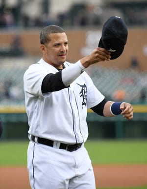 Victor Martinez salutes the fans during a special tribute ceremony Saturday at Comerica Park.