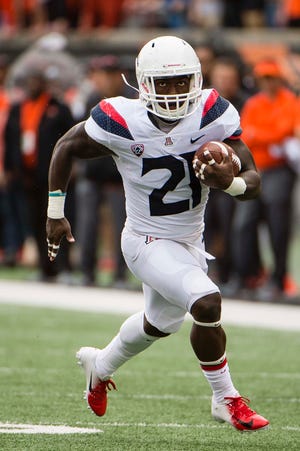 Sep 22, 2018; Corvallis, OR, USA; Arizona Wildcats running back J.J. Taylor (21) breaks free on his way to a touchdown during the first half against the Oregon State Beavers at Reser Stadium.
