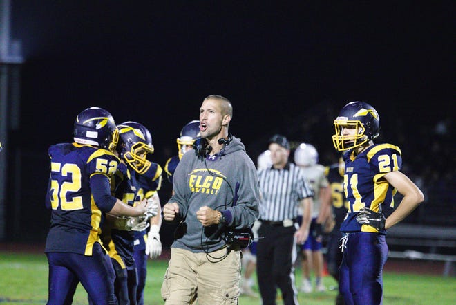 Elco coach Bob Miller wears a look of intensity during the Raiders' 19-14 come-from-behind win over Northern Lebanon on Friday night.