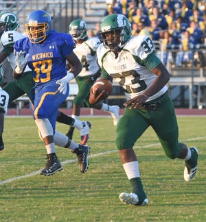 Parkside’s JaBrontae Mills runs the ball during first half action at the Parkside/Wicomico High School Football game Friday, Sept. 21, 2018 at County Stadium. (Photo by Todd Dudek for The Daily Times)  
