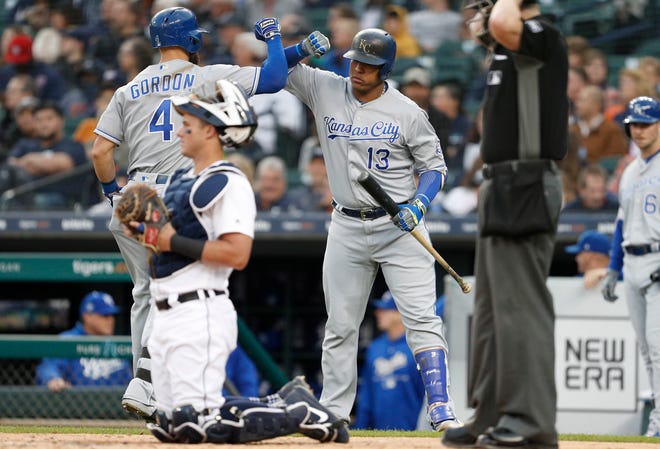 Kansas City Royals left fielder Alex Gordon celebrates with Salvador Perez (13) after hitting a solo home run during the fourth inning against the Detroit Tigers at Comerica Park on Sept. 22, 2018.