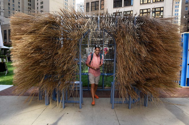 Ben Mothershead, 24, of Detroit exits the Chaffy Sukkah after viewing.