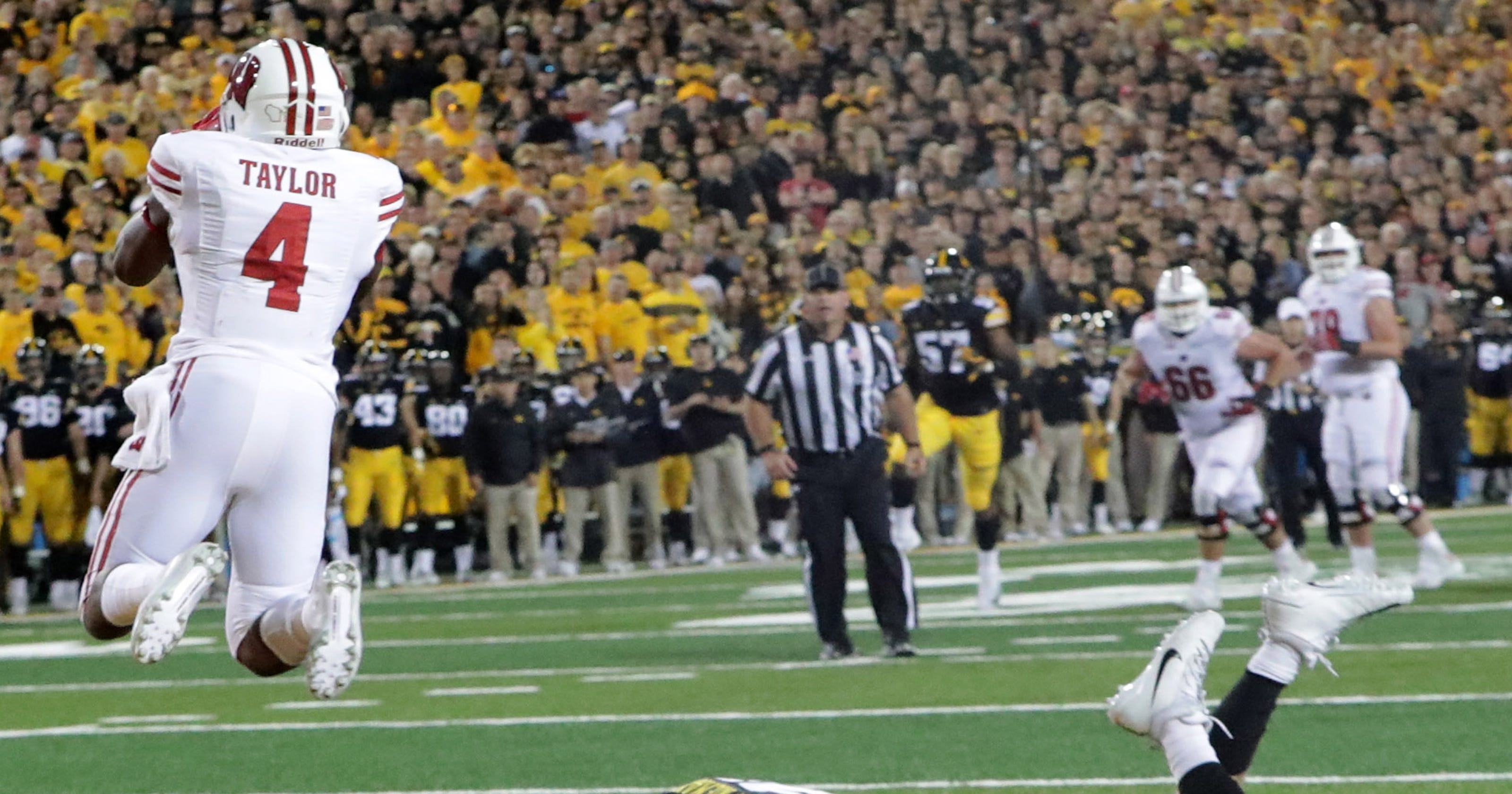 UW 28, Iowa 17 Badgers score twice late in Big Ten opener