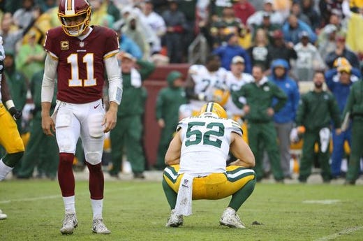 Sep 23, 2018; Landover, MD, USA; Green Bay Packers linebacker Clay Matthews (52) reacts after sacking Washington Redskins quarterback Alex Smith (11) in the third quarter at FedEx Field. Matthews received a roughing the passer penalty on the play. The Redskins won 31-17. Mandatory Credit: Geoff Burke-USA TODAY Sports