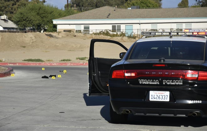 Visalia police investigate an officer-involved shooting near Arco near Lovers Lane on Saturday, Sept. 22.