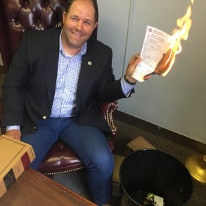 Tennessee state Rep. Andy Holt, R-Dresden, burned one of his red-light camera tickets in a viral video.