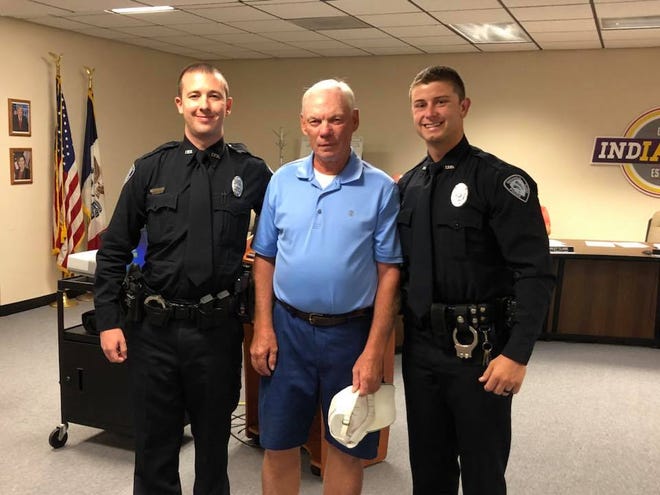 Indianola police Officers Devan Wicks and Brian Stern were honored for helping save the life of Indianola resident Rick McGeough in 2017.