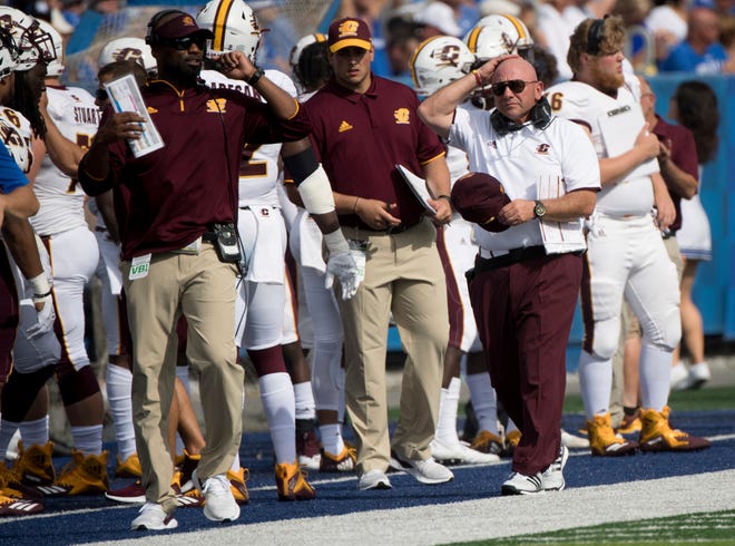 Central Michigan head coach John Bonamego, right, and the Chippewas are 0-3 against FBS competition this season.
