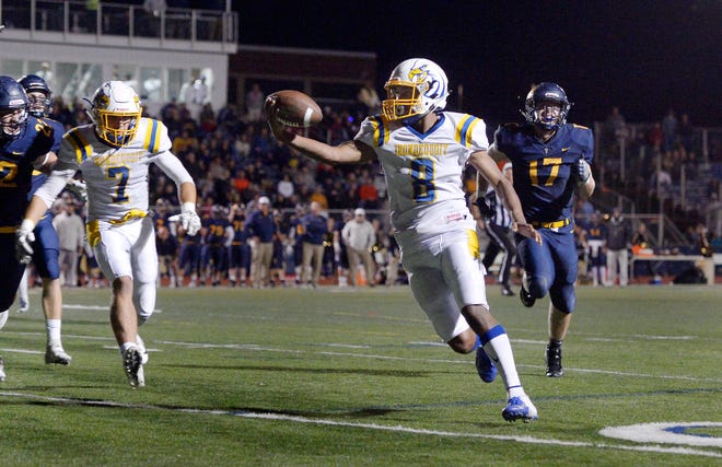 Irondequoit’s Freddy June Jr. extends the ball across the goal line for the game-winning touchdown against Victor during a regular season game played at Victor High School, Sunday, Sept. 23, 2018. Irondequoit beat Victor 28-21.