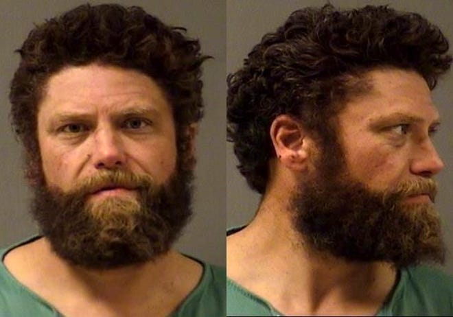 This undated photo provided by the Yellowstone County Sheriff's Office shows 41-year-old Ryan McElmury, of Cody, Wyo. McElmury was taken into custody Monday, Sept. 24, 2018, in Billings, Mont., after police say he led them on a 50-minute pursuit that involved 10 crime scenes, five stolen vehicles, occasional gunfire and plenty of property damage. Charges had not yet been filed Tuesday. (Yellowstone County Sheriff's Office via AP)