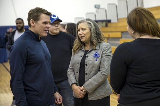 Colts general manager Chris Ballard greets Mary Jackson, mother of late player Edwin Jackson, after a vigil remembering Jackson and Uber driver Jeffrey Monroe back in February. Eight months later, Ballard remains in touch with the family.