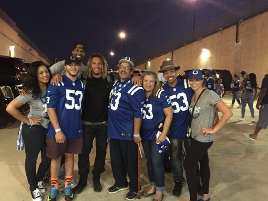 The Jackson crew poses with Edwin after a Colts' game.