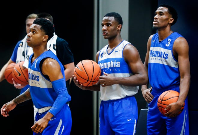Memphis Tigers teammates (left to right) Tyler Harris, Alex Lomax, and Jeremiah Martin during an open practice Tuesday afternoon at the Laurie-Walton Family Basketball Center.