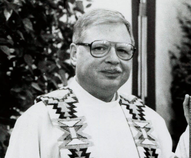 This 1989 file photo shows Father Arthur Perrault in Albuquerque, N.M. Perrault, who fled the U.S. decades ago amid allegations of child sex abuse and once blamed his behavior on a cancer diagnosis which prosecutors say he didn't have, is scheduled to appear in court Tuesday, Sept. 25, 2018.