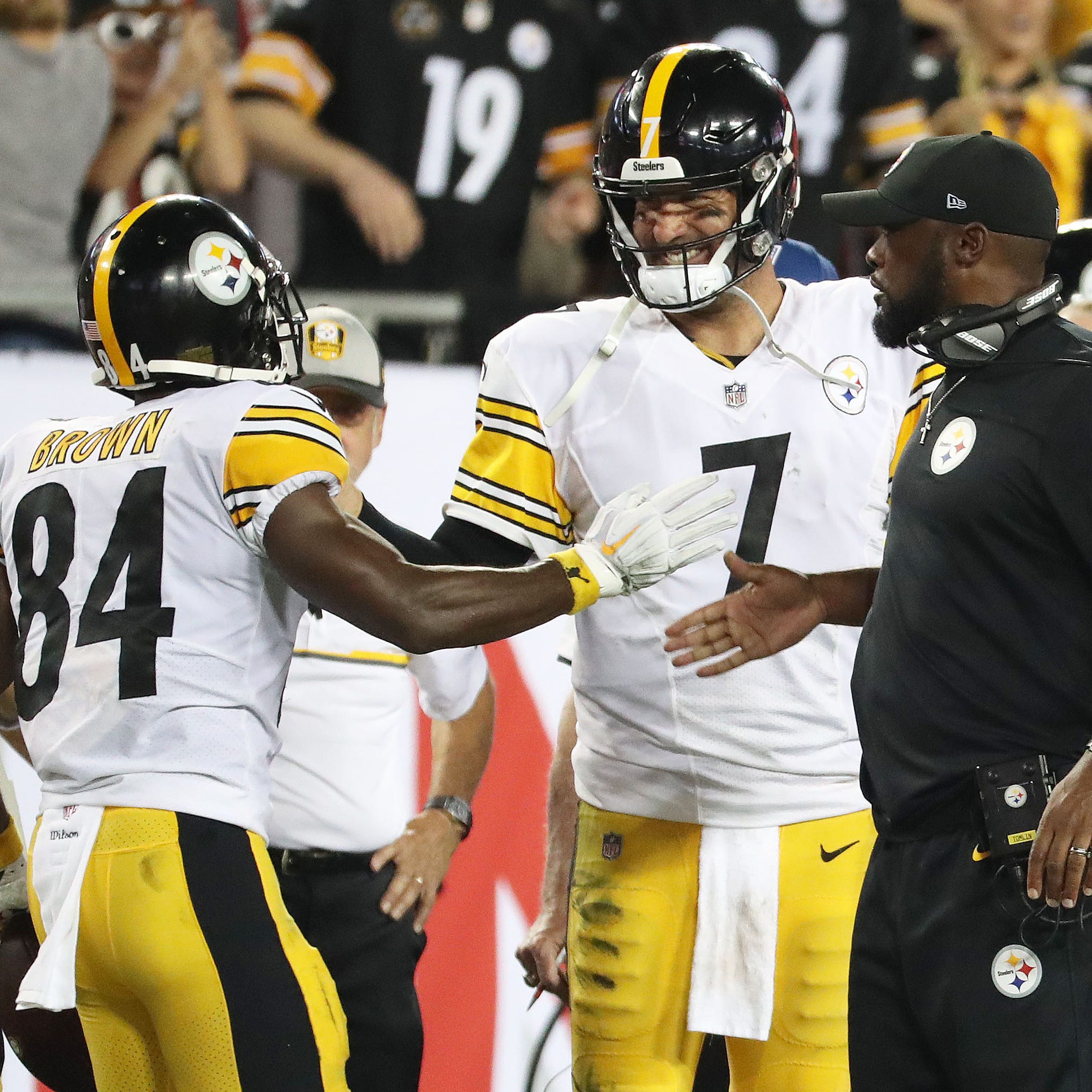 Steelers WR Antonio Brown (84) celebrates with QB Ben Roethlisberger (7) and head coach Mike Tomlin after scoring against Tampa Bay on Monday night.