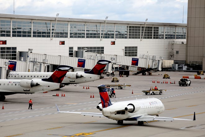 Delta Air Lines planes at the McNamara terminal at the Detroit Metropolitan Airport in Romulus on Wednesday, Sept. 26, 2018. Detroit is Delta's second largest hub.