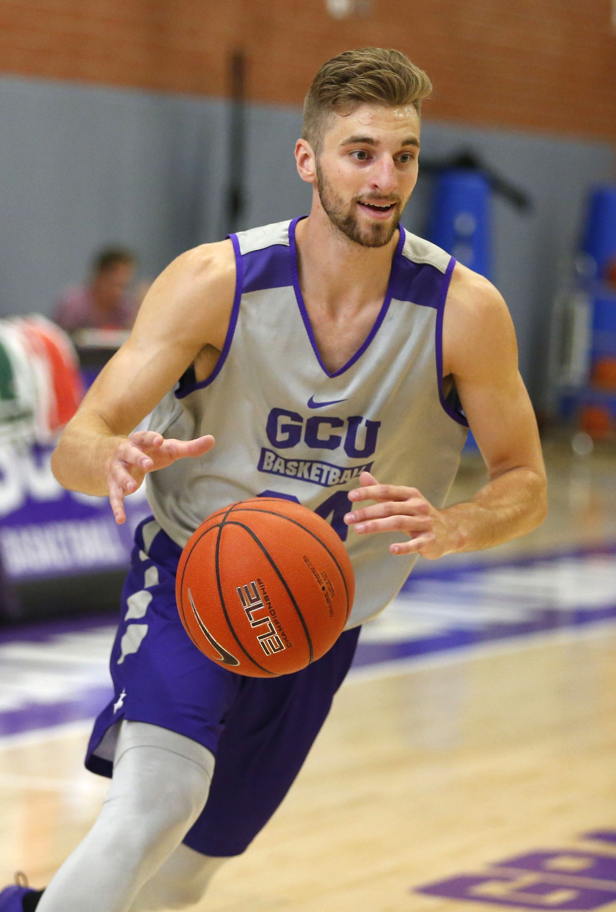 grand canyon university basketball player tim finke, (24) runs a