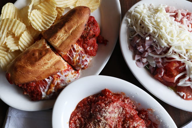 The meatball sub, a bowl of meatballs and a chef salad at South 60 Drive-Thru & Tavern.