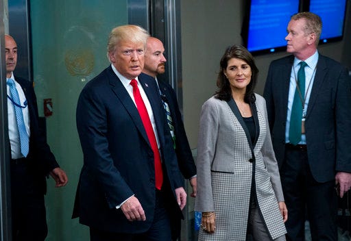 President Donald Trump addresses arrives with Nikki Haley, the U.S. ambassador to the UN, during the 73rd session of the United Nations General Assembly, at U.N. headquarters, Tuesday, Sept. 25, 2018. (AP Photo/Craig Ruttle)