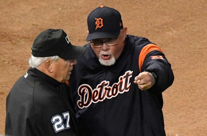 Manager Ron Gardenhire of the Tigers speaks with umpire Larry Vanover after a replay overturned an out during the fifth inning.