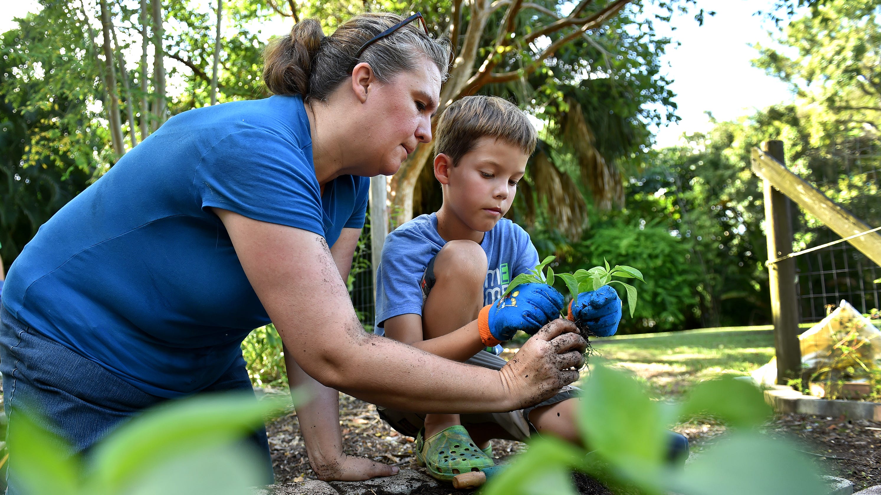 Kids Get Hands Dirty At Community Garden In Fort Pierce At