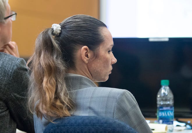 Mary Rice listens as prosecutor Bridgette Jensen gives her closing statements during her trial at the Escambia County Courthouse in Pensacola on Friday, September 28, 2018.