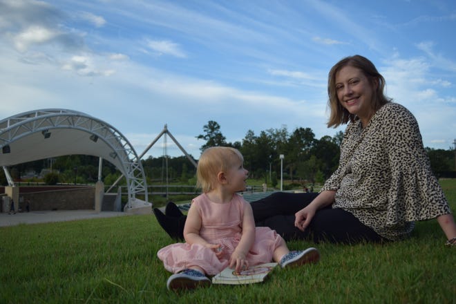 Erin Hoover spends time with her daughter, Hester, at Cascades Park. She’ll read from her debut collection of poems at Midtown Reader on Friday.