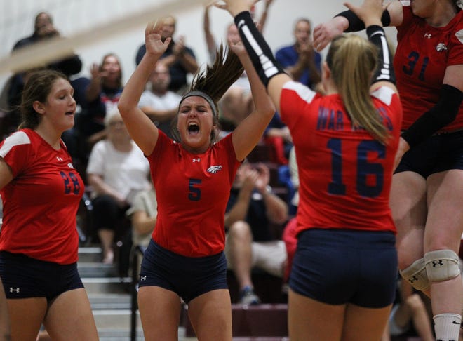 Wakulla's Melanie Oglesby (5) celebrates a point with her teammates during a match against Florida High last week.