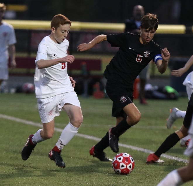 Tappan Zee's Dylan Shalvey, left, advances the ball during a game at Nyack Sept. 26, 2018. Tappan Zee won 5-2.