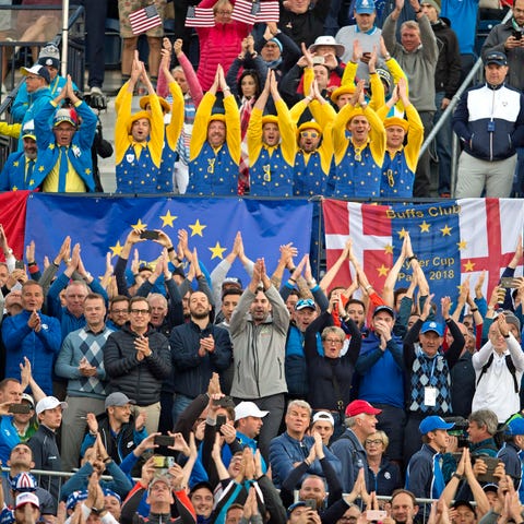 Fans cheer on the first hole during the Ryder Cup...