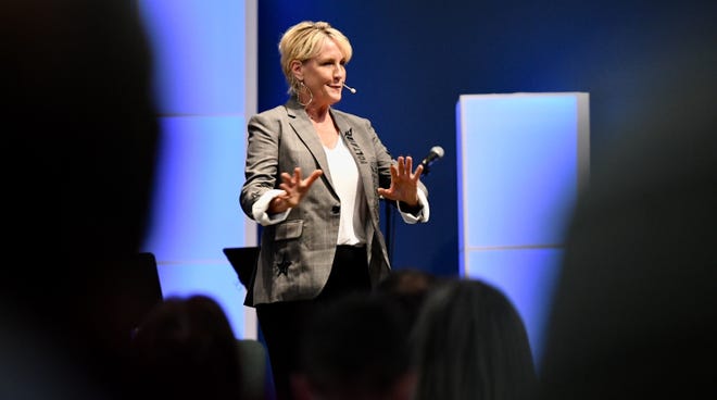 Erin Brockovich speaks to cancer survivors and concerned citizens Saturday at the Kingdoms Gate Worship Center in Satellite Beach.