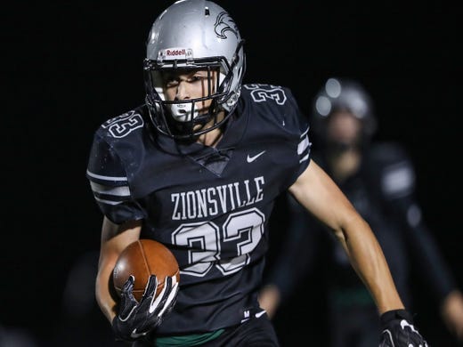 Zionsville students killed last week honored with blue at football game