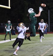 River Dell at Ramapo on Friday, September 28, 2018. R #9 Isaiah Savitt jumps to make a catch for a touchdown in the fourth quarter. 