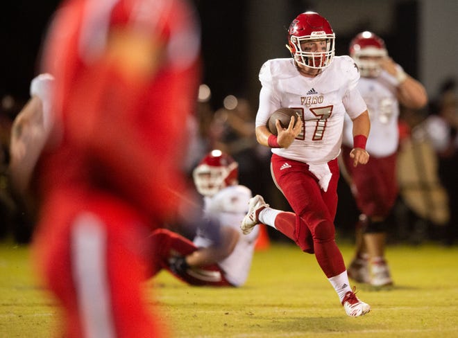 Vero Beach quarterback Nick Celidonio runs under pressure for a big gain in the second quarter against St. Lucie West Centennial during the high school football game Friday, Sept. 28, 2018, at South County Stadium in Port St. Lucie.