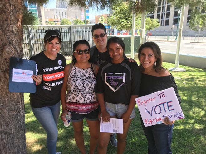 YWCA staff were excited to see Kristina Mendez, second from right, register to vote. She just turned 18 and was at the event with her mother and cousin.